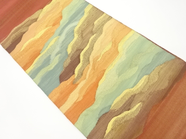 明綴れ波模様織出し袋帯